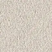 Beige granular texture displaying densely packed, matte particles with irregular, slightly elongated shapes and uniform color distribution.