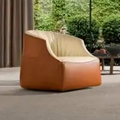 Exceptional 4 Mariani Blob lounge chair with warm brown leather upholstery, creamy beige interior, and black ABS feet
