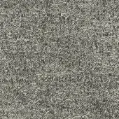 Woven fabric sample in grayscale tones displays a dense, irregular texture with blended dark gray and off-white threads; outdoor textile.