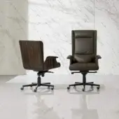 Sophisticated 4 Mariani Garbo armchair with swiveling black chrome base and muted olive-green synthetic upholstery exhibiting refined stitching details