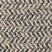 Herringbone fabric texture with light beige and dark brown diagonal weave, displaying a subtle sheen and “reflex ginevra crocodile” label.