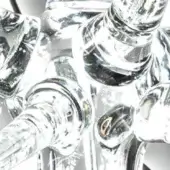 Blown Murano glass lighting component, translucent with rounded forms, exhibiting refractive highlights and asymmetrical organic structure.