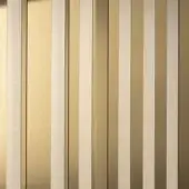 Bronze decor glass panel with vertical brushed metallic strips in a grid pattern, reflecting light and creating subtle linear highlights.