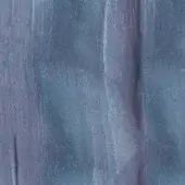 Textured surface of azul macaubas stone with vertical grain, displaying blue and gray marbling, smooth reflective patches, and matte fibrous areas.