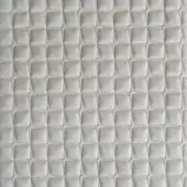 Quilted fabric texture features a repeating light gray rhomboid pattern in a grid, with visible stitching and a matte finish.