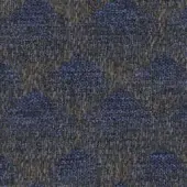 Blue-gray textured fabric sample with irregular weave, mottled with earthy brown flecks, displaying a rough, matte, nubby surface.