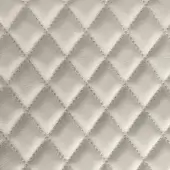 Diamond-quilted textile surface, light gray matelassè weave, repeating geometric pattern with evenly spaced stitching, indoor rugiano embroidery.