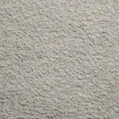 Textured light gray rug with dense granular surface and mottled appearance, displaying a uniform tactile quality under diffused lighting.