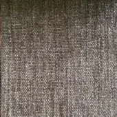 Dark gray woven rug with mottled texture, displaying subtle tonal variations and faint vertical lines across a densely fibrous surface.