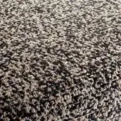 Beige and brown speckled rug with a dense looped pile texture, featuring warm earthy tones and a granular visual effect.