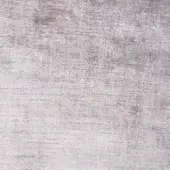 Rugiano rug, light gray, densely woven texture with subtle tonal variations and a nubby surface, displaying a muted, weathered aesthetic.