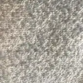 Gray and off-white textured rug with a dense, nubby weave of rounded fibers, displaying subtle tonal variations and a compact, three-dimensional surface.