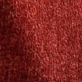 Terracotta rug with dense, textured pile displaying warm, muted tones and granular surface variations; indoor textile element.