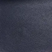 Dark blue Rugiano S5016 leather rug close-up displaying a smooth, dense texture with consistent color and subtle tonal variations.