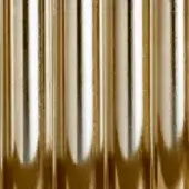 Brass varnished gold texture with repeating vertical cylindrical forms, glossy reflective surface, and rhythmic arrangement of shimmering elements.