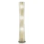 Slamp Bach floor lamp in gold features translucent, fluted panels and a dark circular base, emitting a soft, diffused light against a white backdrop.