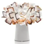 Slamp Clizia table lamp, white base, layered translucent shades, beige to orange gradient, floral canopy, modern sculptural design.