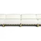 Talenti Casilda sectional sofa, cream fabric, brushed brass frame, modular design, low profile, curved backrest, studio shot.