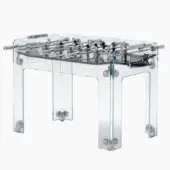 Foosball table, black acrylic, transparent frame reveals silver players and internal mechanism, chrome accents, mesh ball baskets, studio shot.