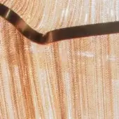 Champagne striated texture with diagonal dark brown band, exhibiting shimmer and layered construction, resembling brushed metal or fabric.