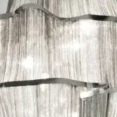 Terzani Atlantis chandelier, nickel finish, cascading reflective strands with curved dark gray metal bands and embedded light sources.
