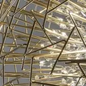 Terzani Core chandelier, gold-plated metal, geometric framework with clear glass crystals, multifaceted design, studio lighting, neutral background.