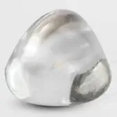 Terzani Mizu sculpture, clear crystal, rounded organic form with internal striations, glossy finish, neutral gray background.