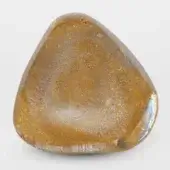 Terzani Mizu Gold Crystal sculpture, amber-gold translucent, asymmetrical river stone form with reflective particles and glossy finish.