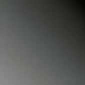 Gray gradient background transitioning from dark to light, diffused studio shot with a minimalist composition and plain backdrop, no visible objects.