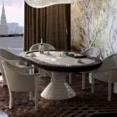 Distinguished Vismara Vegas poker table with a dark glossy microfiber playing surface and sculptural glossy white base