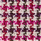 Glen plaid fabric texture, off-white with pink, purple, and brown yarns, featuring a repeating check weave and matte finish.