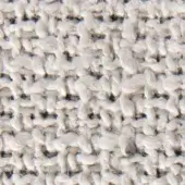 Beige woven fabric texture with looped yarns, heathered tonal variations, and a nubby surface; verzelloni janis 15026 label visible.