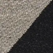 Diagonal fabric texture sample featuring light gray grid weave above dense black velvet, creating contrasting surfaces and a sharp division.