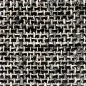 Verzelloni tweed fabric sample, dark gray and off-white heathered weave, Colorado 17005 label visible along edge.