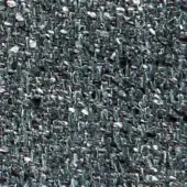 Dark teal woven fabric texture with gray and off-white flecks, displaying a tight, irregular pile and subtle manufacturing markings.