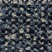 Navy blue woven fabric with silver metallic threads, exhibiting a looped, textured surface and subtle “verzelloni” product labeling.