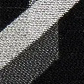 Woven fabric texture, light gray Atena 20024, diagonal band against dense black fibers, contrasting sheen and velvety pile.