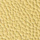 Quilted leather texture displaying a muted yellow tone with a diamond grid pattern and matte finish, featuring visible stitching details.