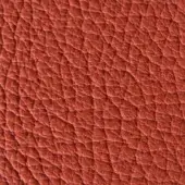 Reddish-brown pebble-grain leather texture with subtle shading variations, displaying a consistent warm tone and irregular bumpy surface.