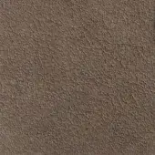 Earthy brown textured surface displaying an irregular, mottled pattern with a matte finish and subtle tonal variations in a close-up view.