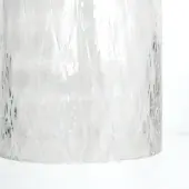 Glass lamp shade with diamond texture, clear cylindrical form, faceted surface reflecting light, neutral frosted tone on white background.