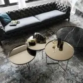 Exceptional Cattelan Italia Billy coffee table with tiered circular mirrored glass tops and brushed matte black metal base
