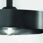 Black pendant light, matte finish, dual concentric shades with clear glass bulb, minimalist modern design, flush mount installation.