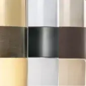 Vistosi Futur MC1 glass cylinders in bronze, black, and brown with champagne, white, and beige translucent sections, studio shot.