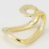 Gold sculptural ring, twisted metal band, asymmetrical looped design with curved intersecting sections, polished finish, neutral background.