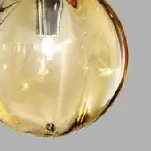 Amber glass pendant light, chrome fitting, rounded sphere shape with swirling patterns, Vistosi Puppe Amtr design, exposed bulb.