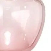 Pink glass vase, rounded apple shape, glossy finish reflects light, studio shot, seamless molded construction, pale consistent hue.