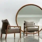 Sophisticated Porada Vera lounge chair with Canaletto walnut, Cuoietto leather accents and textured neutral gray fabric upholstery in satin finish