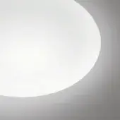 Frosted glass lampshade, spherical shape, white color, diffused light, minimalist design, gray wall backdrop, Vistosi manufacturer.