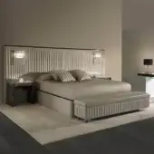 Distinguished Reflex Plissé XL bed with upholstered headboard and frame in muted beige textile with shiny metal and ebony wood accents